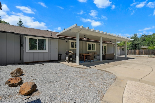 4223 Alta Mesa Dr, Redding, CA 96002 - rear view of property with board and batten siding, ceiling fan, a patio area, an outdoor living space, and roof with shingles