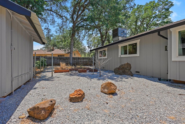 4223 Alta Mesa Dr, Redding, CA 96002 - view of yard featuring a garden and central AC