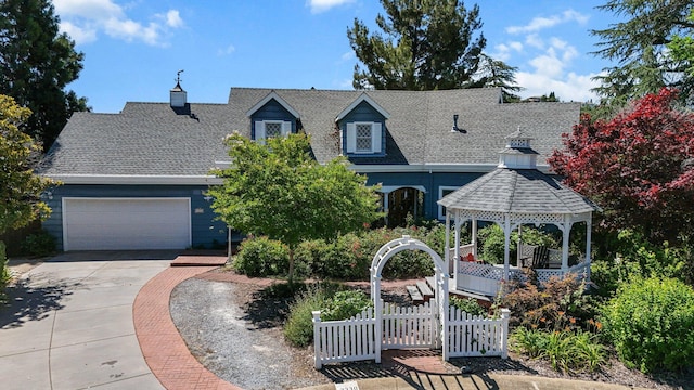 3330 Scenic Dr, Redding, CA 96001 - view of front of house featuring a gazebo, concrete driveway, an attached garage, and a shingled roof