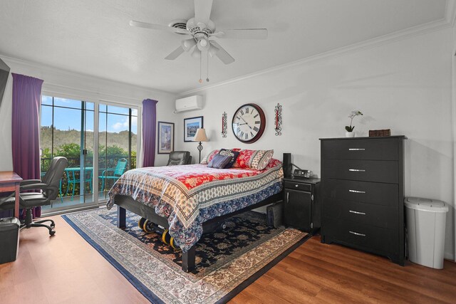 3330 Scenic Dr, Redding, CA 96001 - bedroom featuring an AC wall unit, a desk, access to exterior, crown molding, and wood finished floors