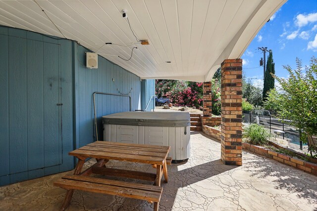 3330 Scenic Dr, Redding, CA 96001 - view of patio / terrace featuring a hot tub
