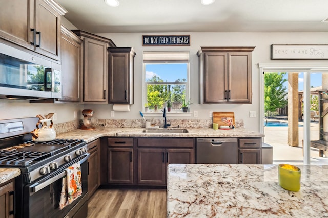 3126 Chaucer Way, Shasta Lake, CA 96019 - kitchen featuring stainless steel appliances, a sink, healthy amount of natural light, light wood-style flooring, and recessed lighting