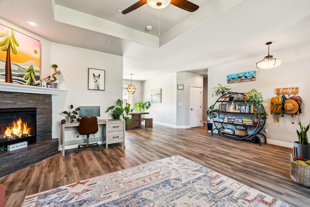 3126 Chaucer Way, Shasta Lake, CA 96019 - office space with wood finished floors, a ceiling fan, baseboards, a stone fireplace, and recessed lighting