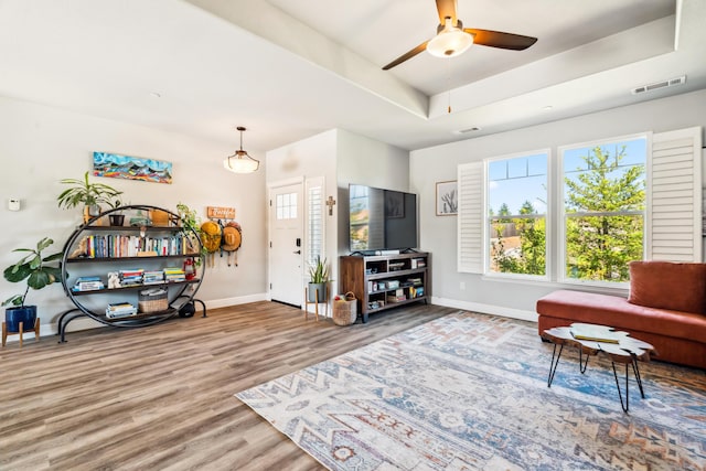 3126 Chaucer Way, Shasta Lake, CA 96019 - living room with baseboards, wood finished floors, ceiling fan, and a raised ceiling