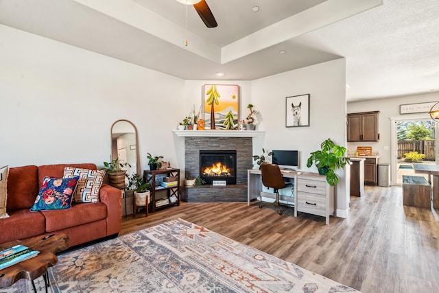 3126 Chaucer Way, Shasta Lake, CA 96019 - living room featuring a ceiling fan, light wood-style flooring, a desk, a fireplace, and recessed lighting