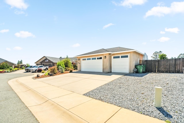 3126 Chaucer Way, Shasta Lake, CA 96019 - ranch-style home with driveway, stucco siding, and a garage