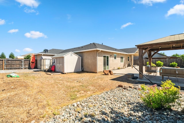 3126 Chaucer Way, Shasta Lake, CA 96019 - back of property with a patio area, a fenced backyard, and a gazebo