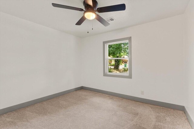 5890 Missouri Ln, Anderson, CA 96007 - empty room featuring carpet, baseboards, and a ceiling fan