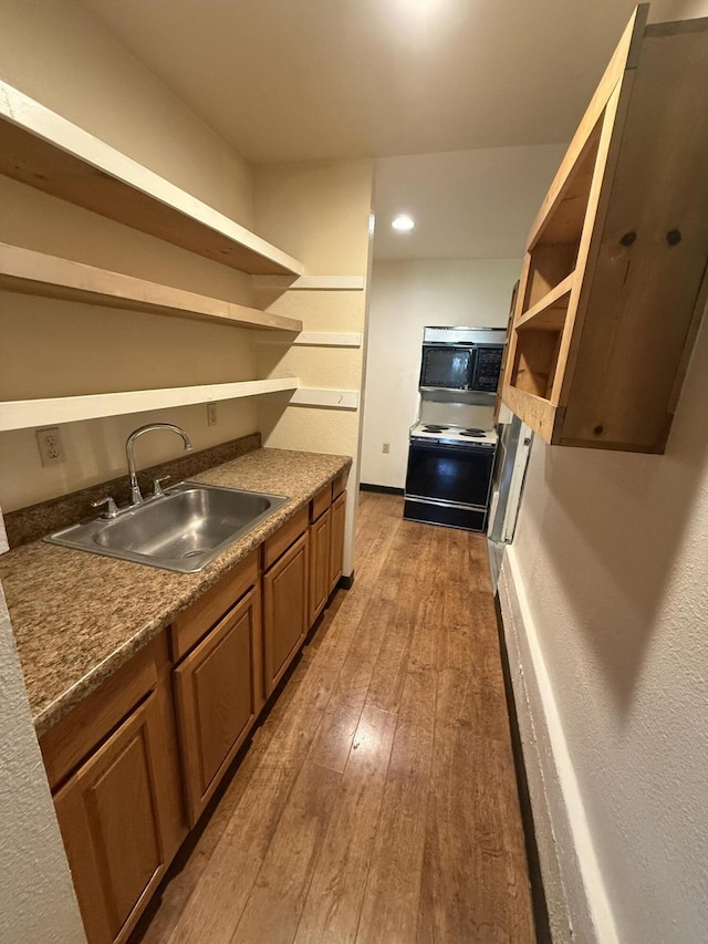 5890 Missouri Ln, Anderson, CA 96007 - kitchen with open shelves, electric stove, a sink, light wood finished floors, and recessed lighting