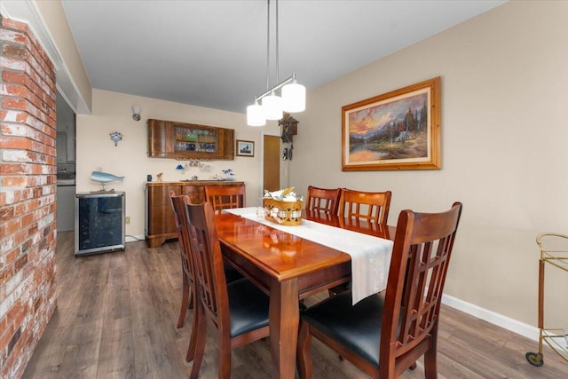 21350 Wilcox Rd, Red Bluff, CA 96080 - dining area featuring dark wood-style floors and baseboards