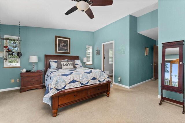 21350 Wilcox Rd, Red Bluff, CA 96080 - carpeted bedroom featuring multiple windows, baseboards, and ceiling fan