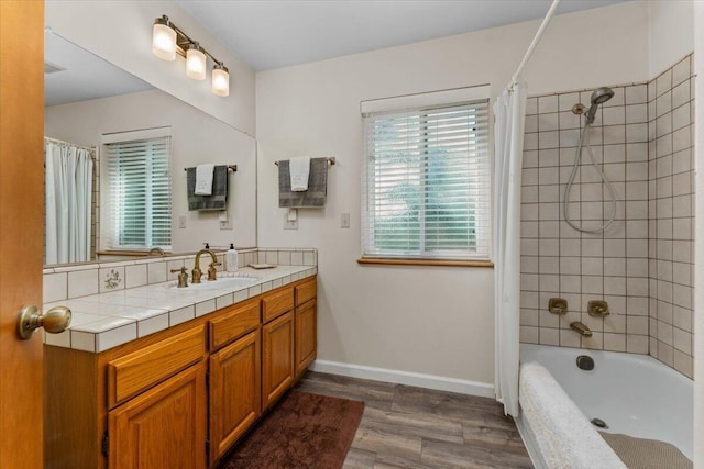 21350 Wilcox Rd, Red Bluff, CA 96080 - full bathroom featuring vanity, shower / bath combo, wood finished floors, and baseboards