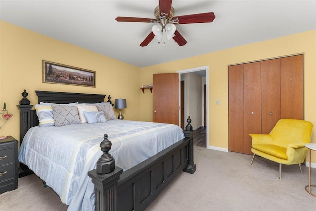 21350 Wilcox Rd, Red Bluff, CA 96080 - bedroom featuring light colored carpet, baseboards, a closet, and ceiling fan