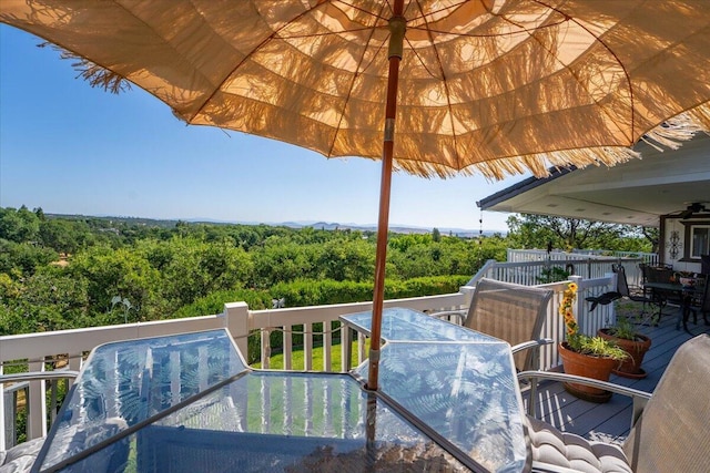 21350 Wilcox Rd, Red Bluff, CA 96080 - wooden deck with outdoor dining area and a forest view