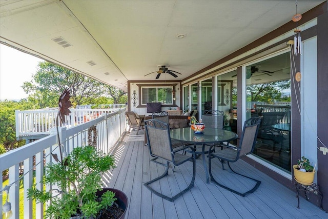 21350 Wilcox Rd, Red Bluff, CA 96080 - wooden deck featuring ceiling fan and outdoor dining space