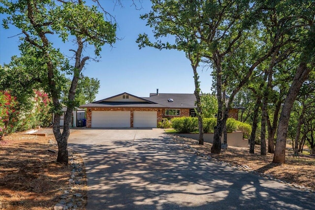21350 Wilcox Rd, Red Bluff, CA 96080 - ranch-style house with driveway and a garage