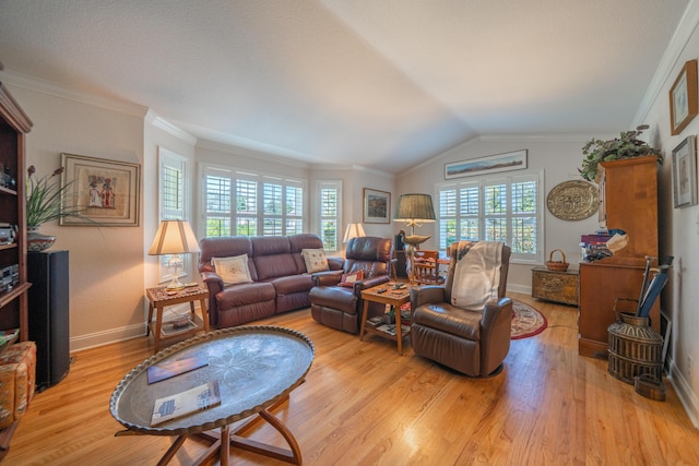 3811 Andes Dr, Redding, CA 96001 - living room with light wood-style flooring, baseboards, lofted ceiling, and crown molding