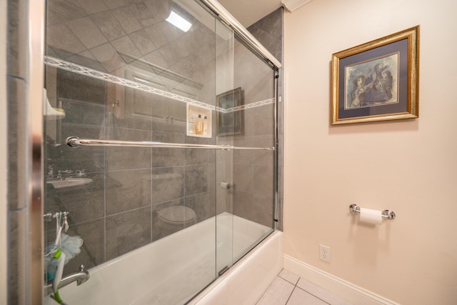 3811 Andes Dr, Redding, CA 96001 - bathroom with tile patterned flooring, combined bath / shower with glass door, and baseboards