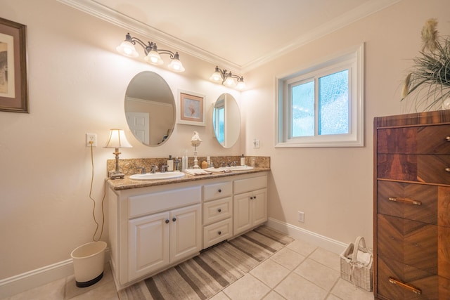 3811 Andes Dr, Redding, CA 96001 - bathroom featuring double vanity, tile patterned floors, baseboards, and crown molding
