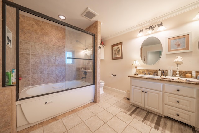 3811 Andes Dr, Redding, CA 96001 - full bath featuring toilet, vanity, ornamental molding, tile patterned flooring, and enclosed tub / shower combo