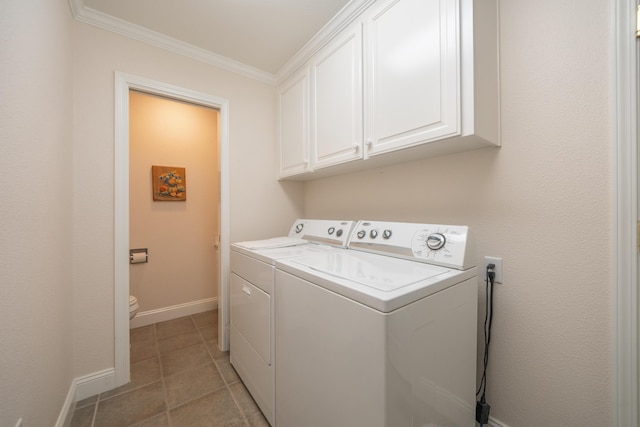 3811 Andes Dr, Redding, CA 96001 - washroom with washer and clothes dryer, crown molding, baseboards, cabinet space, and light tile patterned floors