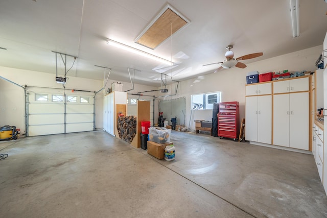 3811 Andes Dr, Redding, CA 96001 - garage featuring a garage door opener