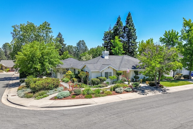 3811 Andes Dr, Redding, CA 96001 - view of front of house featuring a chimney