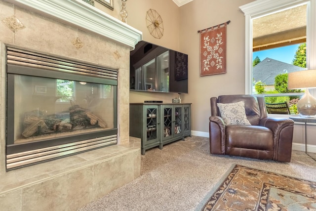 2830 Montana Sky Dr, Redding, CA 96002 - living area featuring baseboards, plenty of natural light, carpet flooring, and crown molding