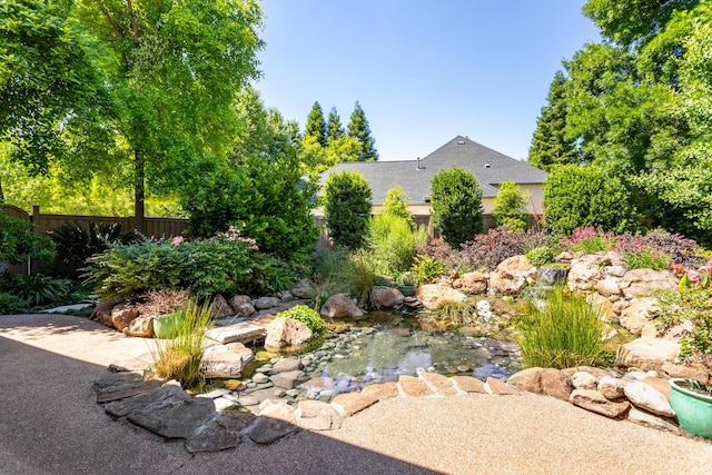 2830 Montana Sky Dr, Redding, CA 96002 - view of yard with a garden pond