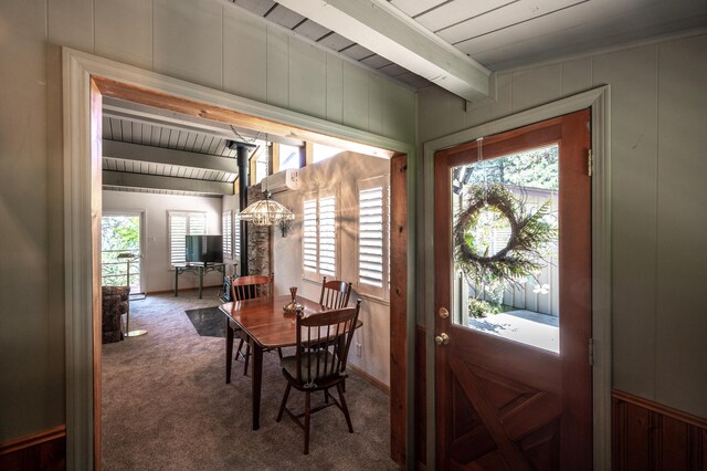 19370 Mountain Maple Rd, Lakehead, CA 96051 - dining space featuring carpet flooring, plenty of natural light, and wood ceiling with exposed beams