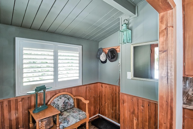 19370 Mountain Maple Rd, Lakehead, CA 96051 - living area featuring plenty of natural light, wooden walls, wainscoting, and vaulted ceiling