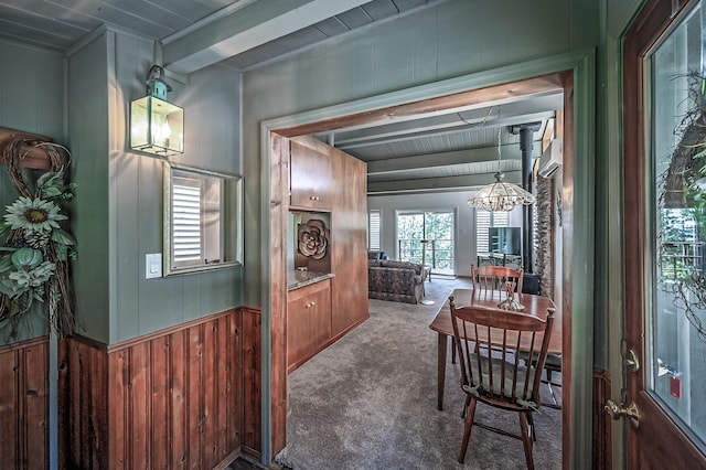 19370 Mountain Maple Rd, Lakehead, CA 96051 - corridor featuring carpet floors, wooden walls, and wooden ceiling with exposed beams