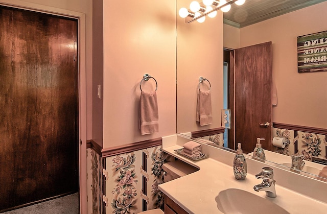 19370 Mountain Maple Rd, Lakehead, CA 96051 - bathroom with toilet, vanity, and ornamental molding