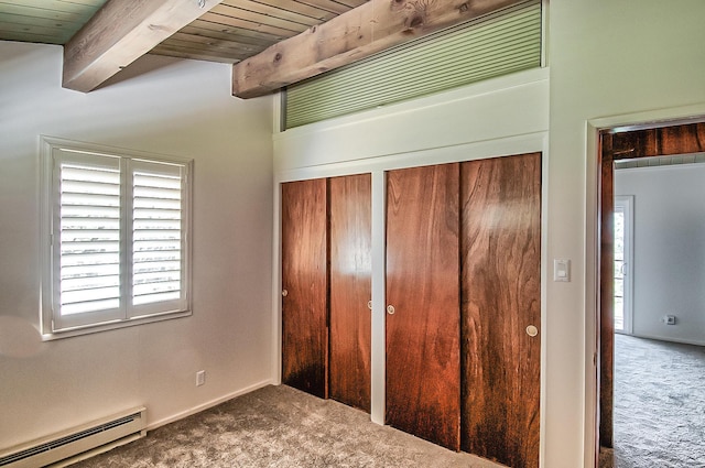 19370 Mountain Maple Rd, Lakehead, CA 96051 - unfurnished bedroom with carpet, a baseboard radiator, two closets, and wooden ceiling with exposed beams