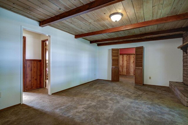 2915 Rockabye Ln, Redding, CA 96002 - unfurnished living room with carpet floors and wood ceiling with exposed beams