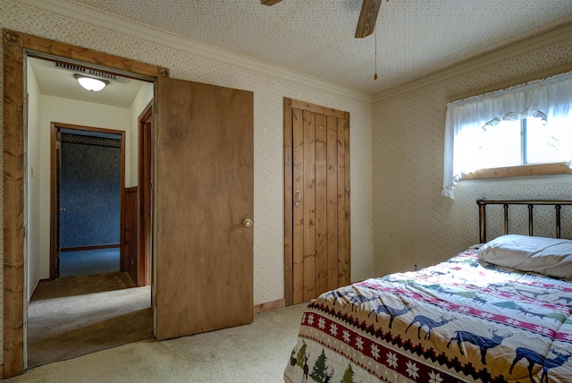 2915 Rockabye Ln, Redding, CA 96002 - bedroom with carpet flooring, wallpapered walls, ornamental molding, and ceiling fan