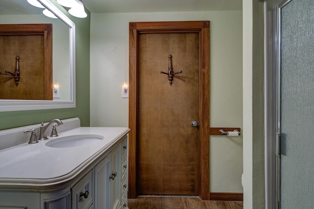2915 Rockabye Ln, Redding, CA 96002 - bathroom with vanity and wood finished floors