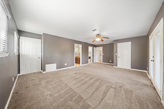 2190 Skyline Dr, Redding, CA 96001 - unfurnished bedroom with baseboards, carpet floors, ensuite bath, and a ceiling fan