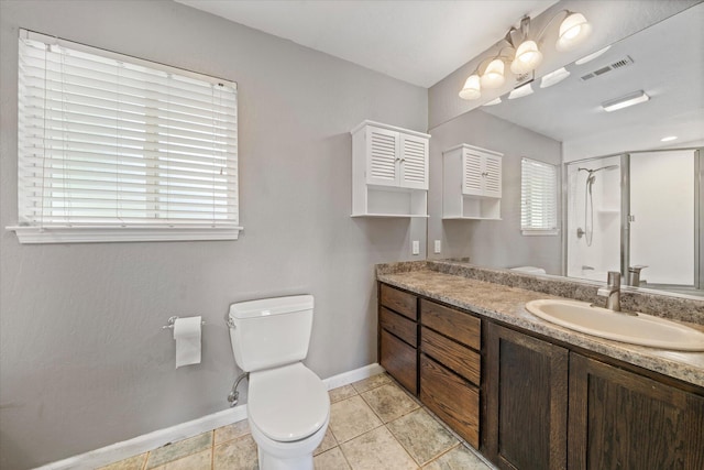 2190 Skyline Dr, Redding, CA 96001 - full bath featuring toilet, double vanity, baseboards, and a shower with door