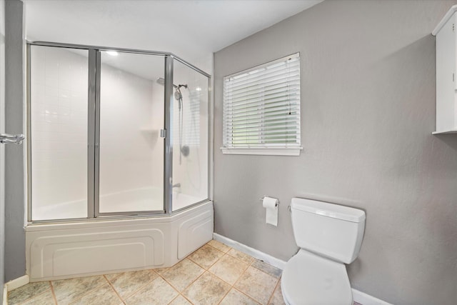 2190 Skyline Dr, Redding, CA 96001 - bathroom with toilet, baseboards, bath / shower combo with glass door, and tile patterned flooring