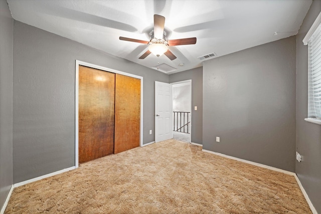 2190 Skyline Dr, Redding, CA 96001 - unfurnished bedroom with carpet flooring, a closet, baseboards, and ceiling fan