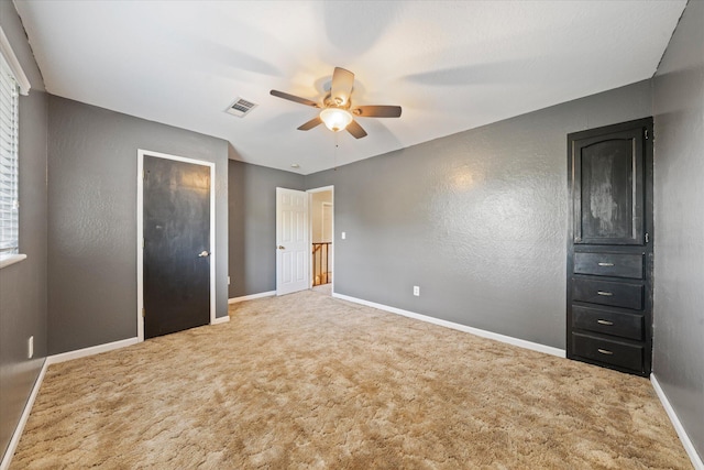 2190 Skyline Dr, Redding, CA 96001 - unfurnished bedroom featuring carpet, baseboards, and ceiling fan