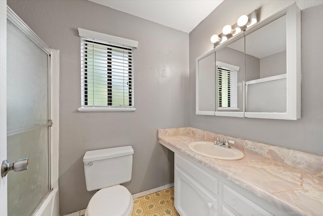 2190 Skyline Dr, Redding, CA 96001 - bathroom with plenty of natural light, vanity, toilet, and baseboards