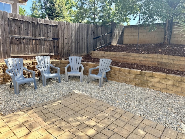 2135 Vienna Way, Redding, CA 96003 - fenced backyard featuring a patio area