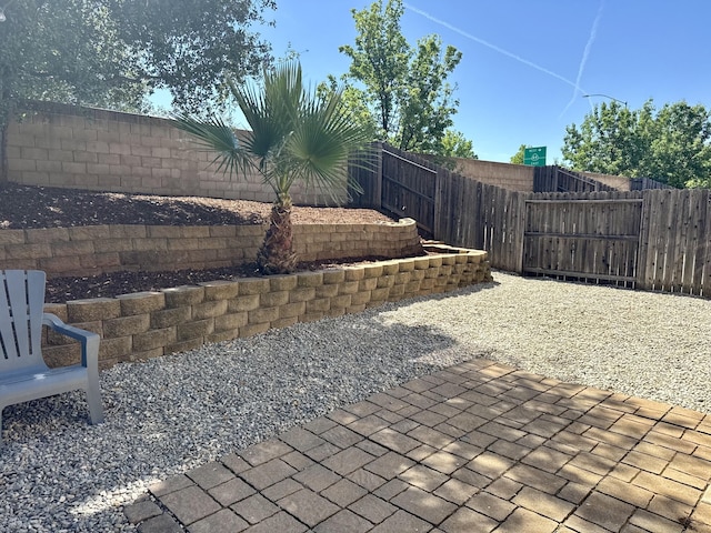 2135 Vienna Way, Redding, CA 96003 - fenced backyard featuring a patio