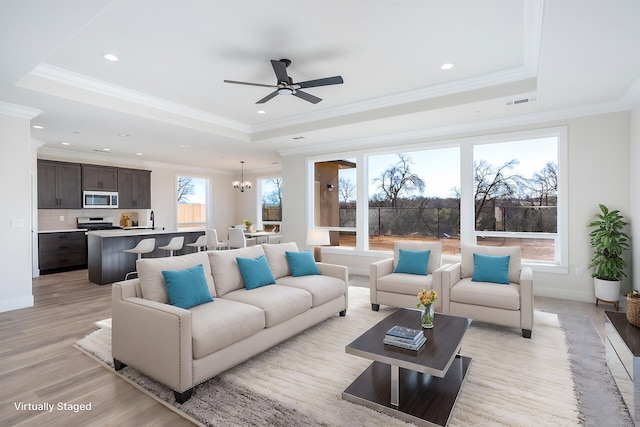 20171 Solomon Peak Dr Lot 20, Anderson, CA 96007 - living area with a tray ceiling, ceiling fan, recessed lighting, crown molding, and light wood-type flooring