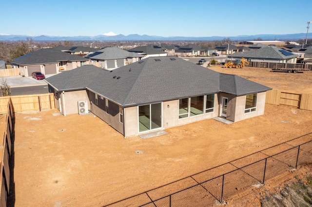 20171 Solomon Peak Dr Lot 20, Anderson, CA 96007 - rear view of house with a residential view, stucco siding, a fenced backyard, and roof with shingles