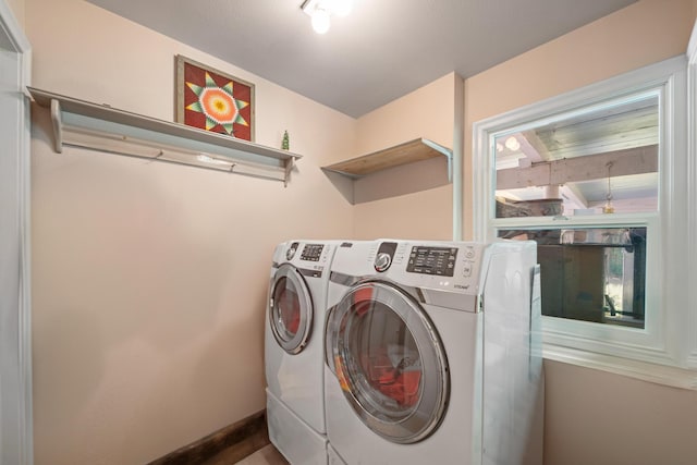 2940 Felstet Ln, Redding, CA 96001 - laundry area with washing machine and clothes dryer