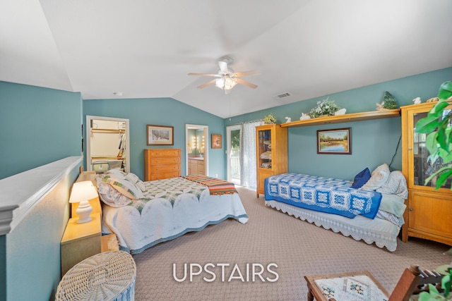 2940 Felstet Ln, Redding, CA 96001 - bedroom featuring vaulted ceiling, carpet, ceiling fan, and connected bathroom
