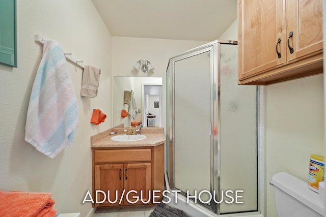 2940 Felstet Ln, Redding, CA 96001 - bathroom with vanity, a shower with shower door, and tile patterned floors